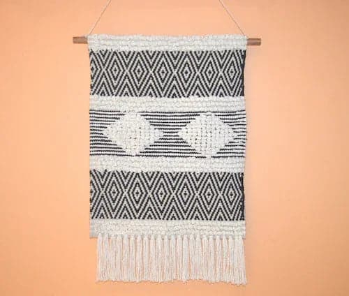 Black and Ivory Woven Geometric Wall Hanging With Fringe